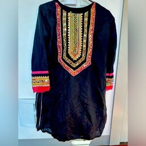 Medium size dress black and pink in color